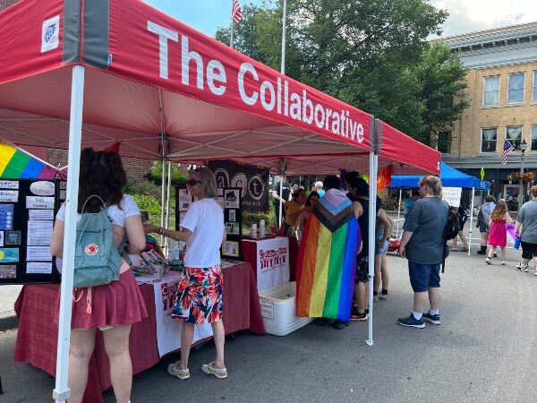 The Collaborative information tent at a community Pride event
